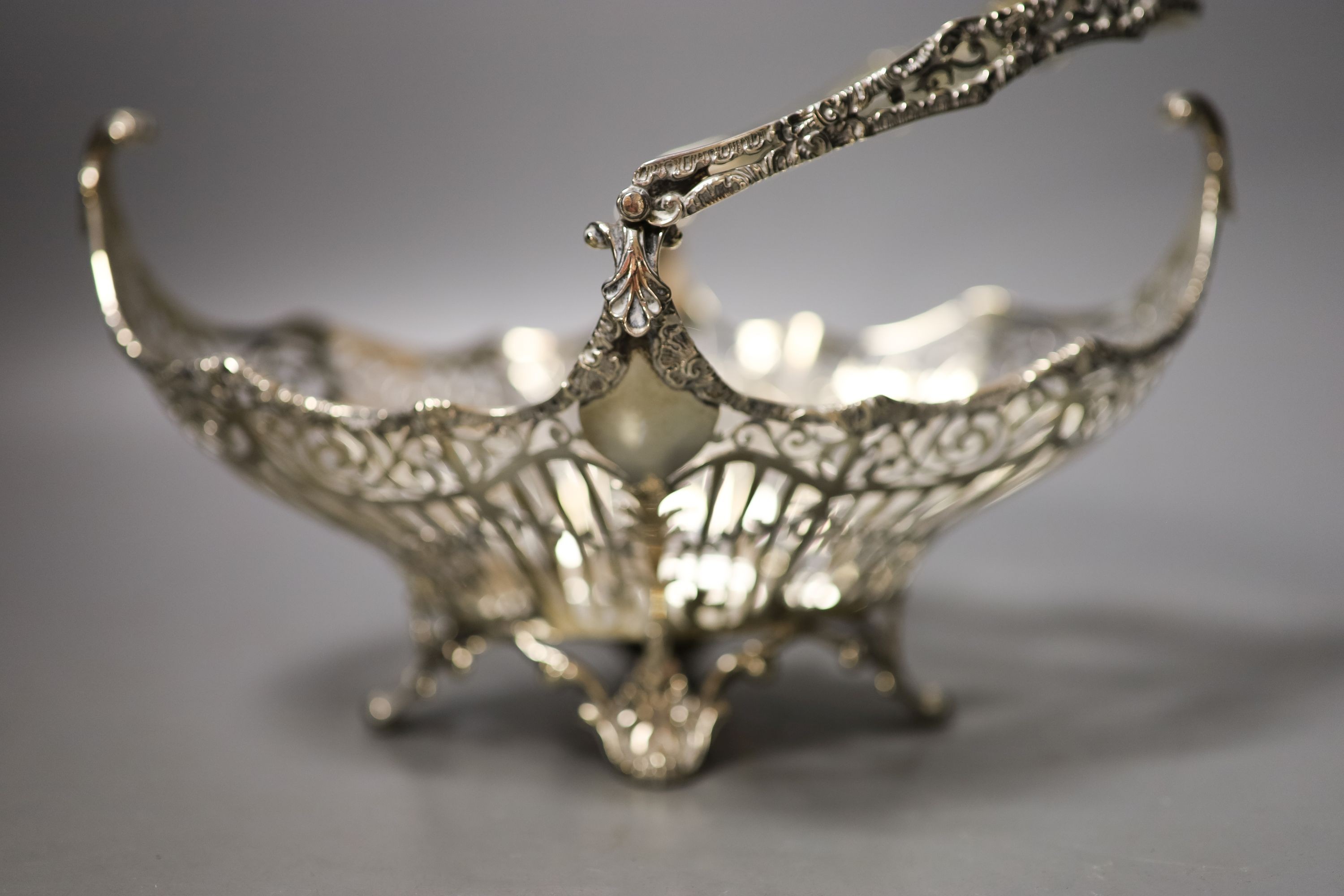 A George V pierced silver oval fruit basket, Josiah William & Co, London, 1920, length 25.5cm, 16oz.